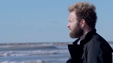 Young man’s profile reflecting despair Stock Footage 285530076