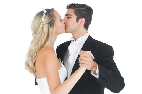 Young married couple dancing viennese waltz kissing each other Stock Photos