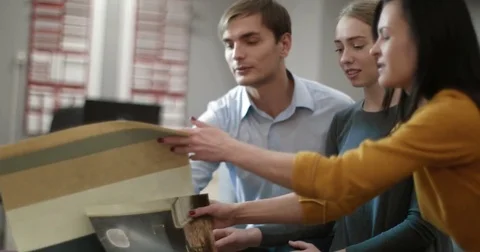 Young married couple is getting advice on the interior issue Stock Footage 83077615