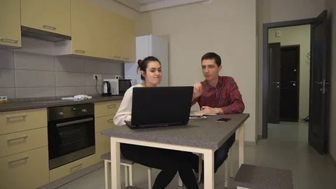 Young married couple have fun discussed a family business Stock-Footage 79655437