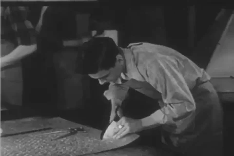 Young men apprentice to become air conditioning installers in the 1940s Stock Footage 92636008