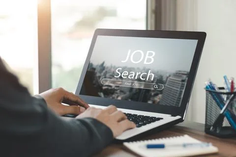 Young men back view online job search using computer app job search, career s Stock Photos