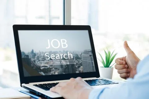 Young men back view online job search using computer app job search, career s Stock Photos