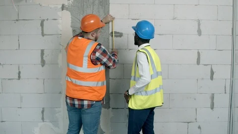 Young men dancing on construction site Stock Footage 125456236