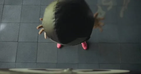 Young men doing intense training slams with a medicine ball. Top view Stock Footage 130219326