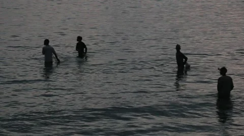 Young men fish with nets at night in Thailand Stock Footage 51022569