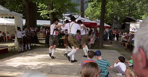 Young men folk dancing in Tiroler folklore costumes, Austria Video stock 79683781