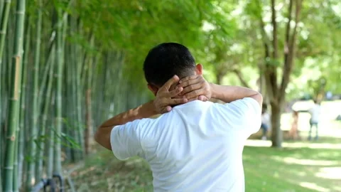 Young men have neck pain Stock Footage 132810746