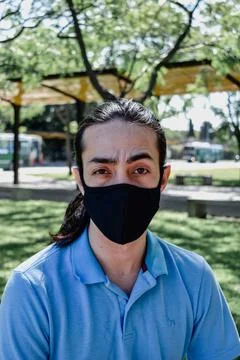 Young men with a indecisive face expression Stock Photos