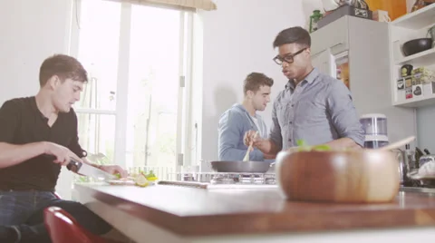 Young men in the kitchen. Student house accommodation.  Flat share with Stock-Footage 32938764