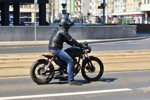 Young men on a motorcycle Stock Photos