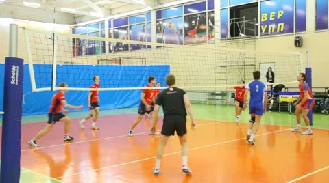 Young men play volleyball in Russian State University. Stock Footage