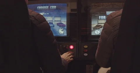 Young Men Playing An Arcade Game Stock Footage 115560054