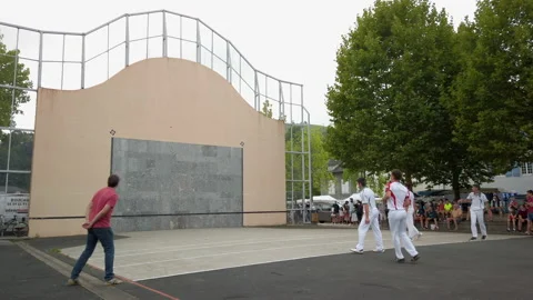 Young men playing Basque Pelota in Mauleon, France Stock Footage 142567146