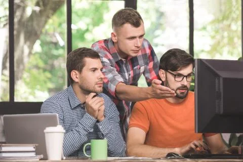 Young men programmers working together in the office 스톡 사진