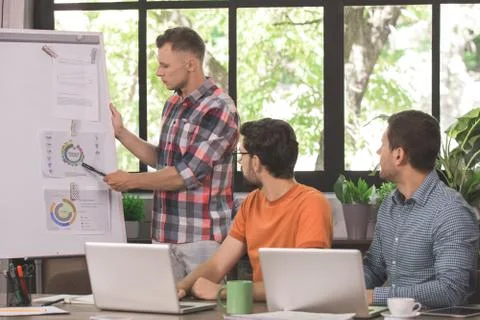 Young men programmers working together in the office 스톡 사진
