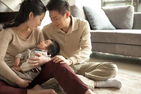 Young men Sitting Son Affectionate Children Adult male Smile Family affection Stock Photos