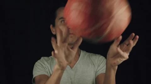 Young men throws and catch pumpkin slowmotion Stock Footage 68185130