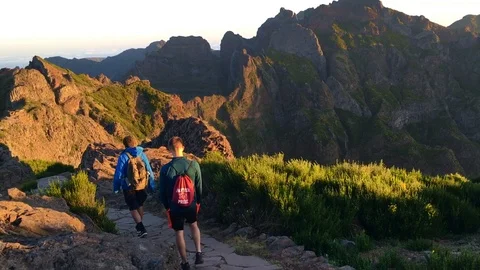 Young men walk on Mountain path in Madeira, Portugal Stock Footage 126453682