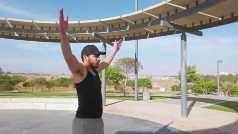 Young men warming up exercises Stock Footage 132932659