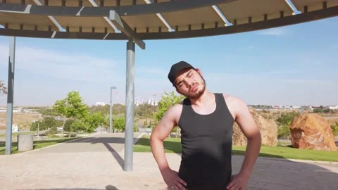 Young men warming up exercises, neck muscle stretching. Stock Footage 133328276