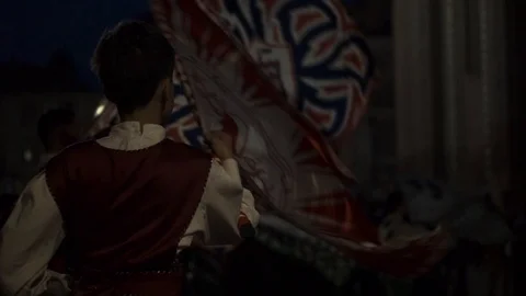 Young men wave flags Stock Footage 89996114