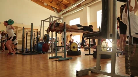 Young men working out in a gym. Stock Footage 54658013