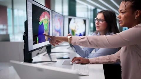 Young Meteorologists Using Computer Stock Footage 330252627