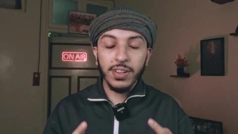 Young Middle Eastern Man Vlogging in Home Studio with ON AIR Sign Stock Footage 318593878