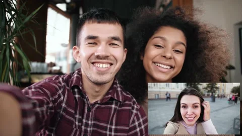 Young mix raced couple video chatting, happy international friends from all Stock Footage 166323174