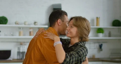 Young mixed couple is dancing and hugging each other Stock Footage 113634524