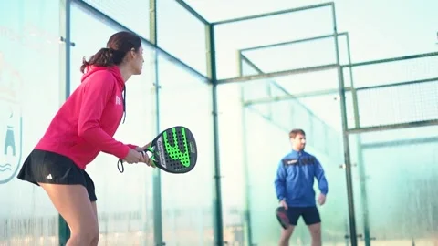 Young mixed match playing padel tennis 스톡 동영상 263616095