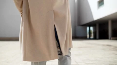 Young mixed race man walking and talking on a smartphone in the city. Stock Footage 182925159