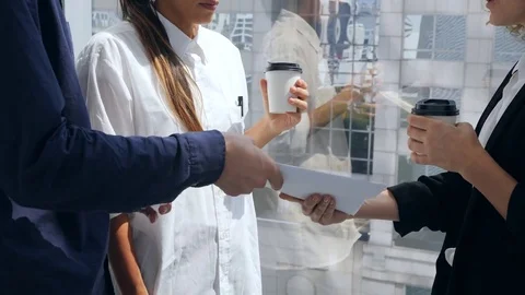 Young Mixed Race Program Developers Made a Deal and Shake Hands with Investor of Stock Footage 82105155