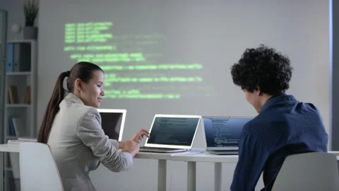 Young Mixed Race Programmers In Class Stock Footage 141983196