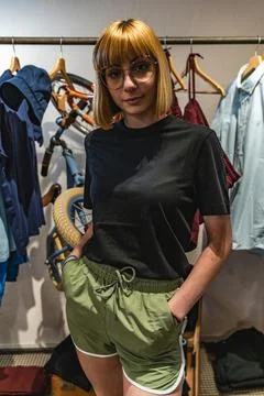 Young model with glasses posing wearing casual clothes for a photoshoot Stock Photos