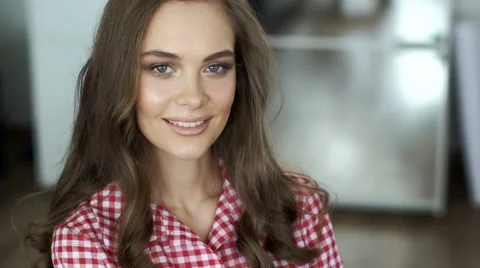 Young model looking and smiling into the camera. Stock Footage 62323735