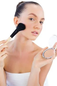 Young model with powder compact and brush Stock Photos