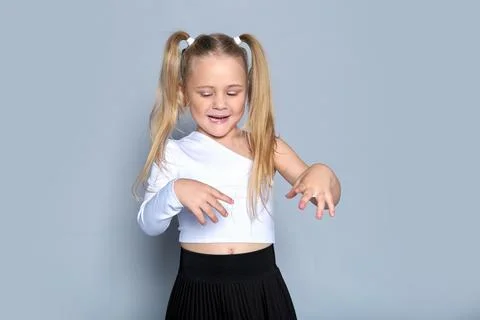 This young model stands with confidence, embodying strength and self-assurance Stock Photos