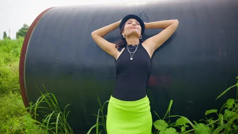 Young Model Stands Gracefully in Confident Pose Stock Footage 295469288