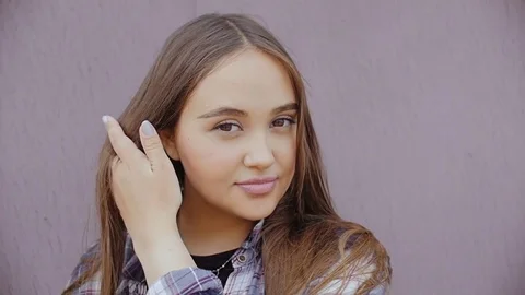 Young model is working on the camera. Video stock 78838809