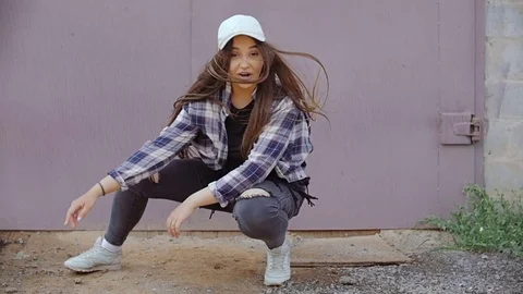 Young model is working on the camera. Video stock 78839559