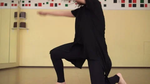 Young modern dancer dancing in the studio. Sport, dancing and urban culture Stock Footage 92898484