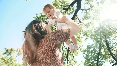 Young mom throws up the baby Video stock 89337137