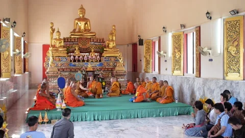 Young monk bows to abbot inside temple. Ordaining ceremony to be a monk Thailand Stock Footage 161791955