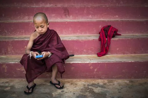 Young monks playing computer games, Pindaya, Shan State, Myanmar (Burma) Stock Photos