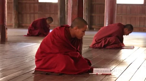 Young monks read mantras in a convent school, Inle lake, Myanmar, Burma Stock Footage 62292686