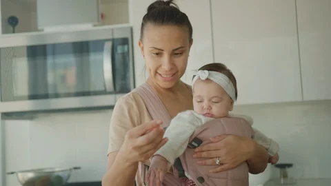 Young mother cook dinner with her little daughter, maternity leave Stockbeeldmateriaal 126358963