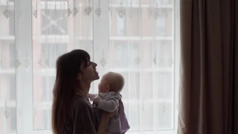 A young mother spends time with her cute daughter Vídeo Stock 237029151