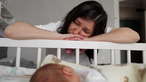 Young mother suffering from postpartum depression Video stock 313342129